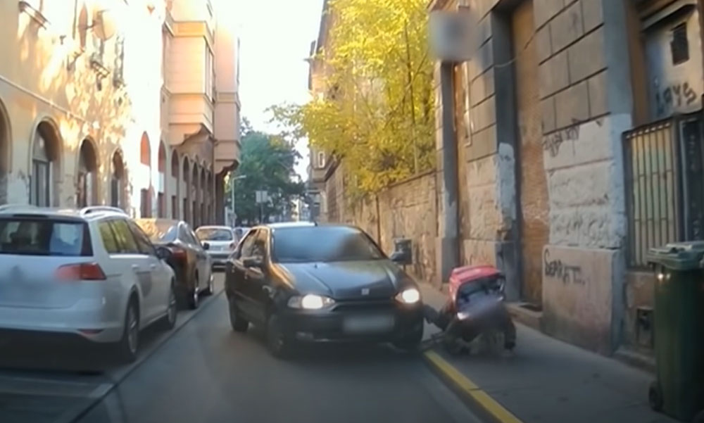 Ilyen szemétládát ritkán látsz: bosszúból elütötte az autós a biciklis futárt, aztán még neki állt feljebb, míg elő nem került egy videófelvétel