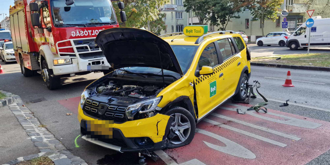 Hatalmas csattanás a 11. kerületben: egy parkoló autót is letarolt a BMW-vel karambolozó budapesti taxis – fotók a helyszínről